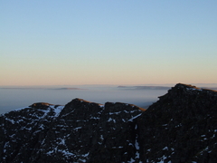 behind the rocky ridge
