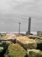 then, under the lighthouse
