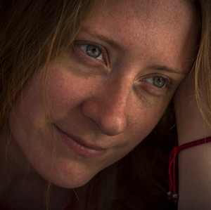 Portrait of girl with red twine