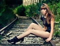 Lady on train tracks