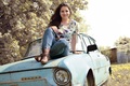 Old car, young woman