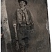 Billy_the_Kid_tintype,_Fort_Sumner,_1879-80.jpg