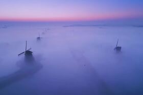 Floating Windmills - Kinderdijk Above The Fog 4K